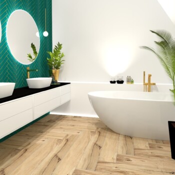 Łazienka z zielonymi płytkami i drewnianą podłogą